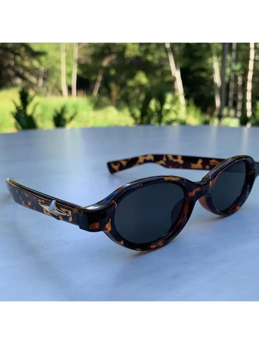 Cyber Star Vintage y2k style cheetah print oval sunglasses. Tinted oval Lenses